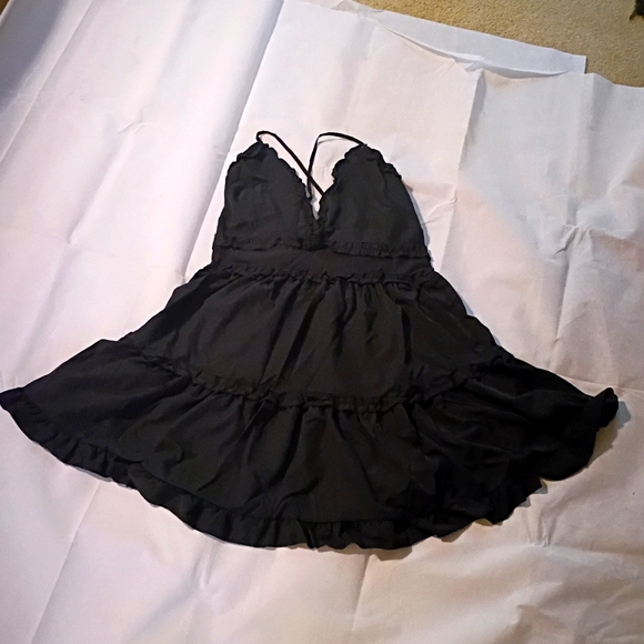 Black Dress with V Neck Ruffled Hem and Spaghetti Straps - Picture 3 of 7